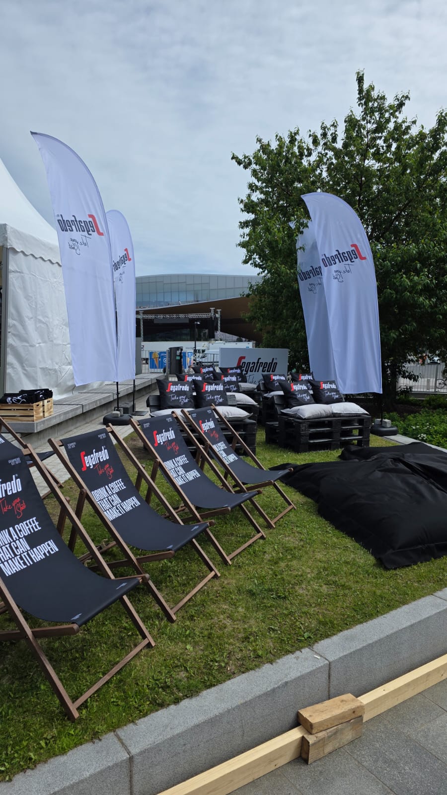 Segafredo deck chairs and beach flags ready for match day at the Coca-Cola Fanzone