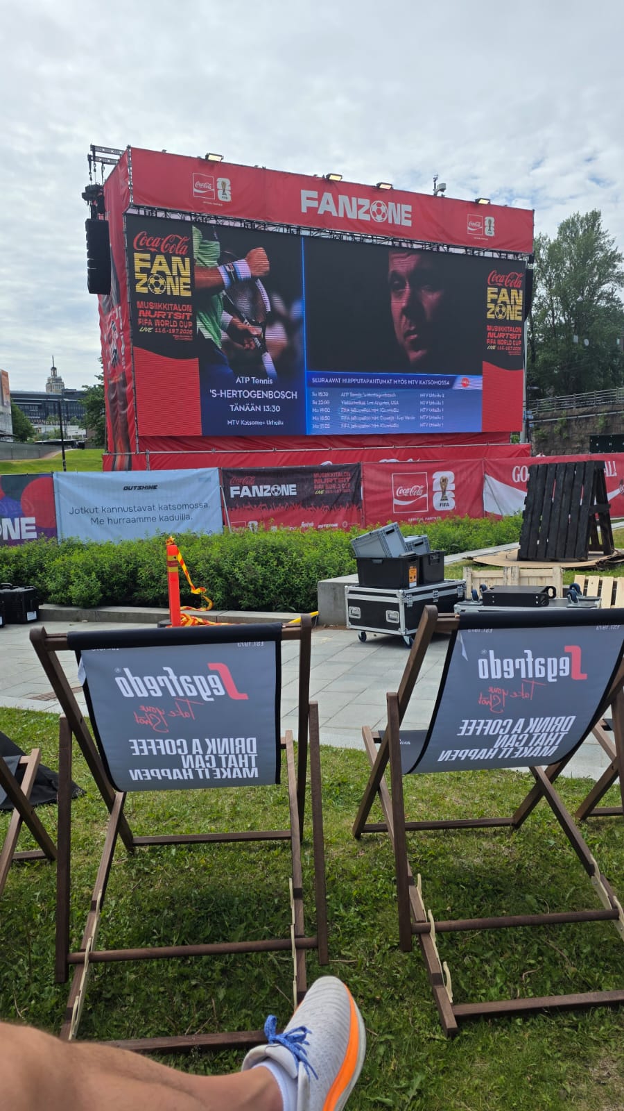 Coca-Cola Fanzone giant LED screen and Segafredo deck chairs during a World Cup match broadcast
