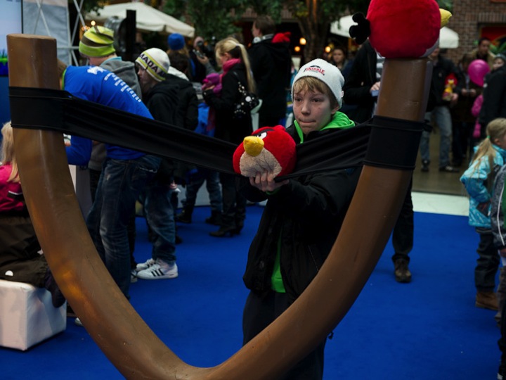 Boy trying the giant slingshot at the Angry Birds Finnish Championship