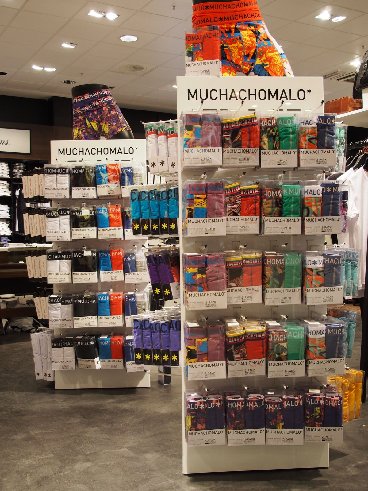 Muchachomalo product display shelf at a department store