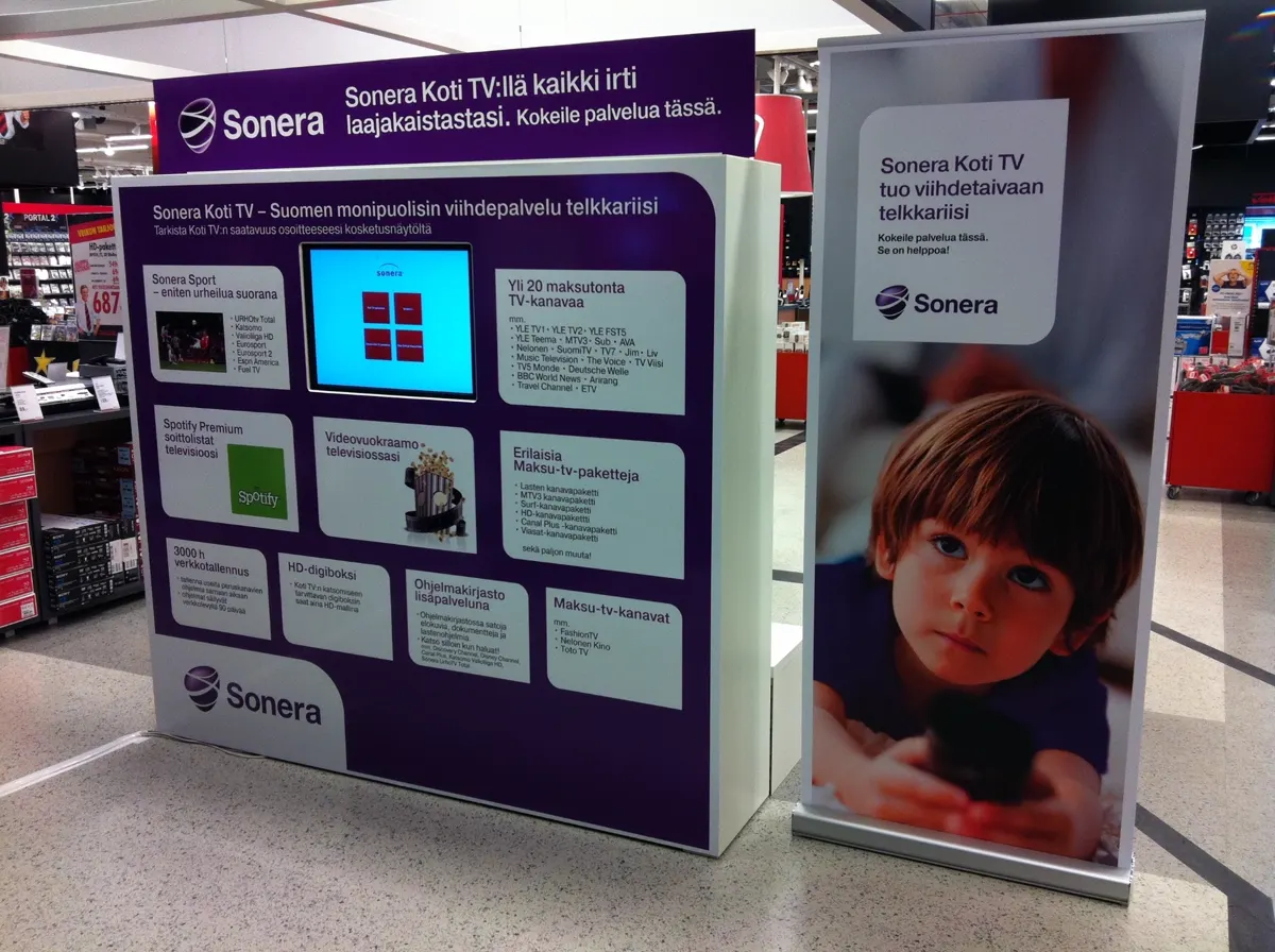 Sonera Koti TV promotional stand at an electronics store
