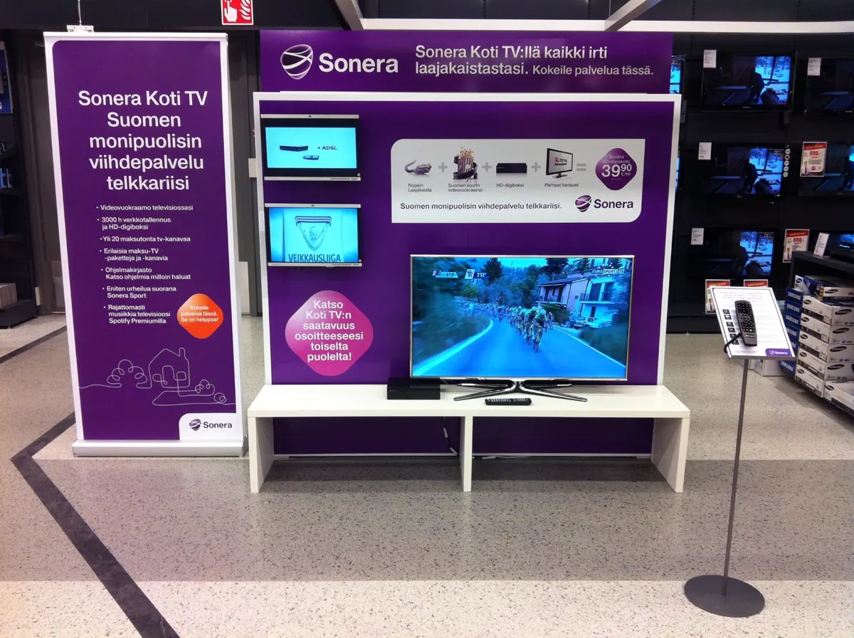 Sonera Koti TV stand with TV demonstration at an electronics store